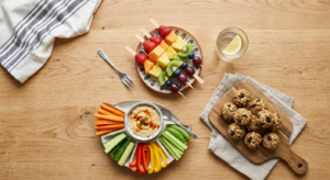 A professional, editorial-style flat lay photograph of colorful, healthy snacks for children, such a